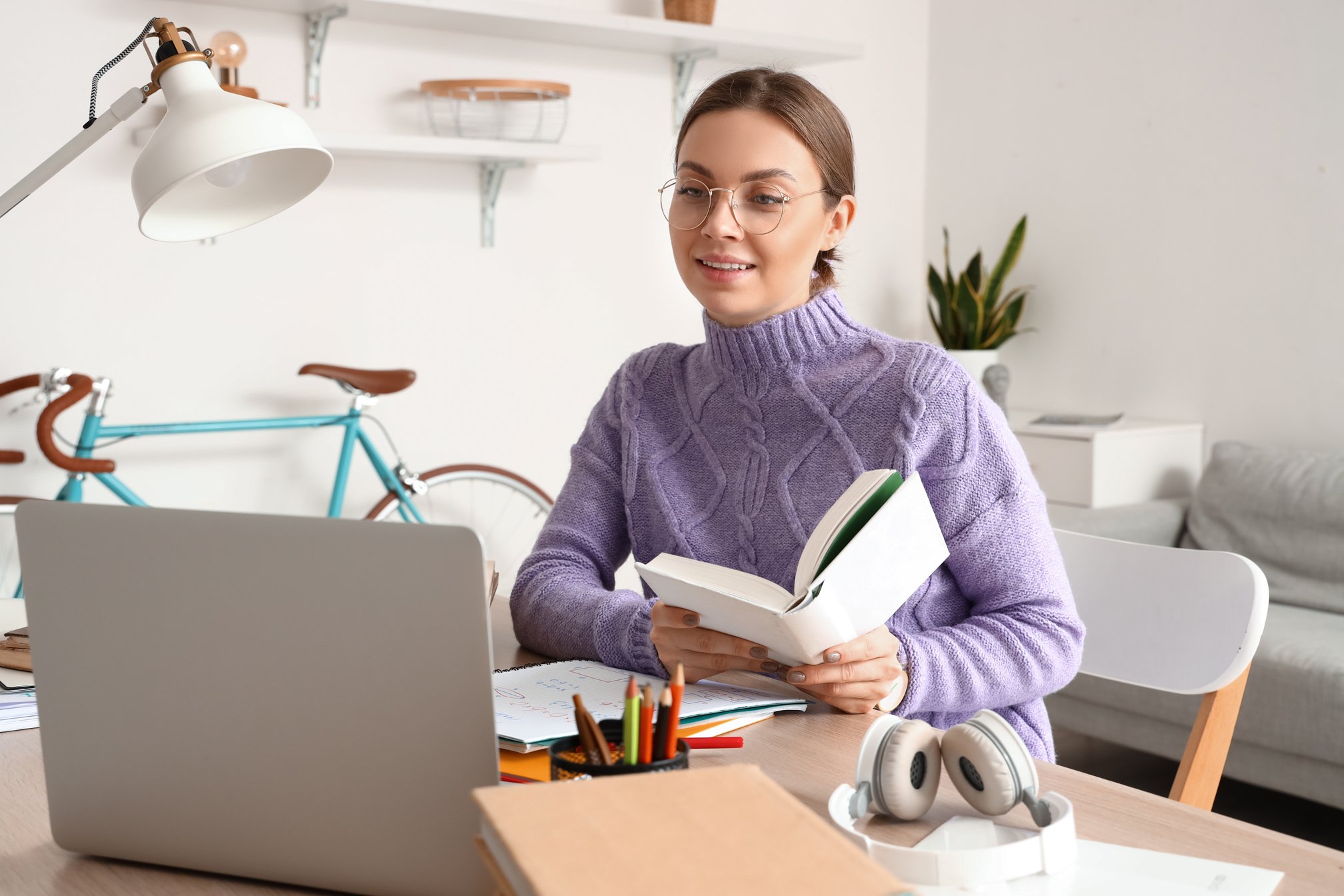 Tutor Giving Lesson Online at Home